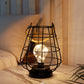 JHY DESIGN 8.5"H Cage Lantern: Decorative Table Lamp, Battery-Powered, Cordless, Warm White Fairy Lights + LED Edison Bulb (Black)