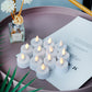 12er-Pack flackernde, flammenlose, batteriebetriebene Kerzen und Teelichter 